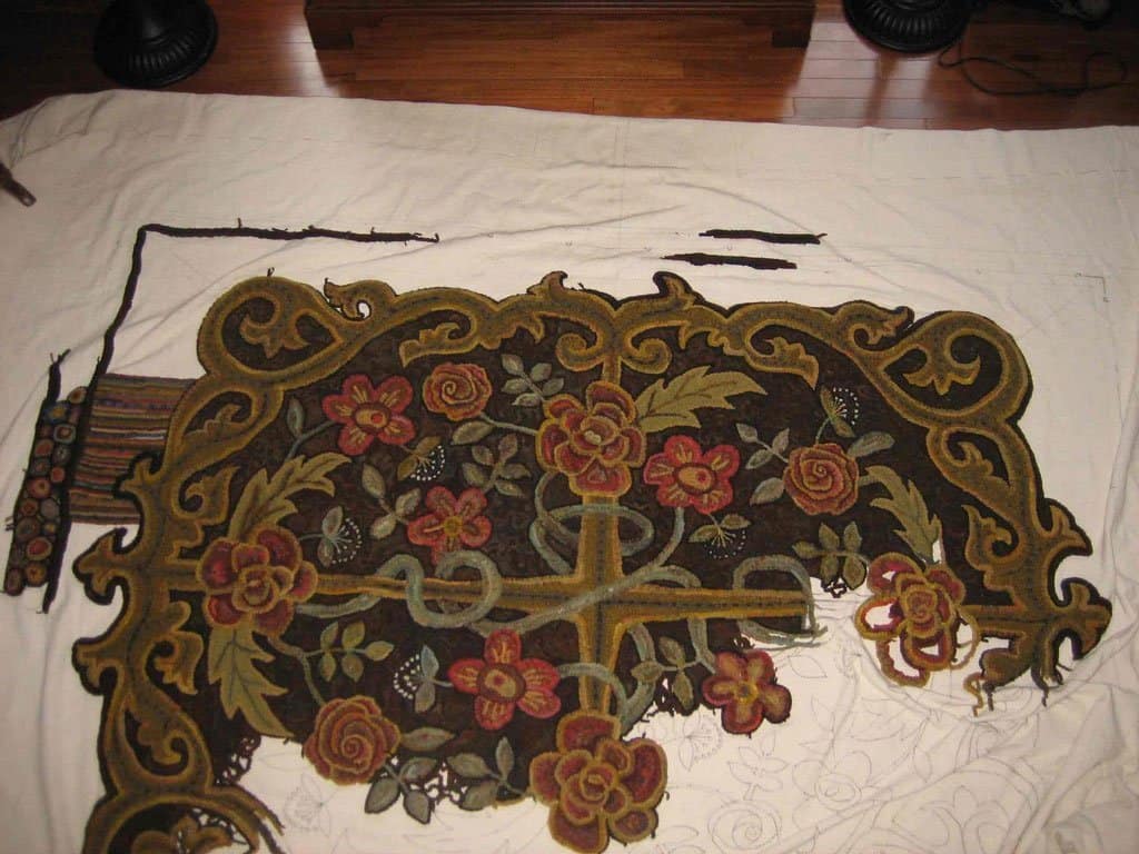 progress made on room sized hooked rug