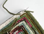 The first step in whipping the edge on a hooked rug