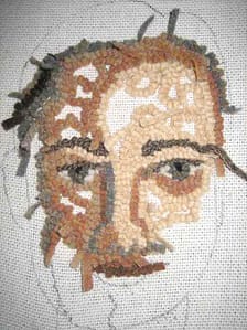 Rug hooking the second eye and the upper lip