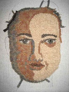 Wide cut rug hooked face roughly done
