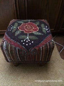 Rose Scroll footstool hooked by Pat Cassidy, pattern designed by Cindi Gay