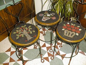 My first rug hooking project, three chairpads, by Cindi Gay