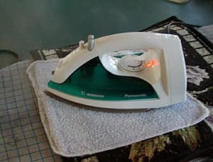 Steaming a hooked rug