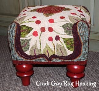 Rug hooking footstool by hooked by Suz White