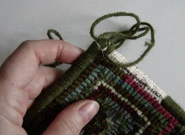 Whipping the corner of a hooked rug