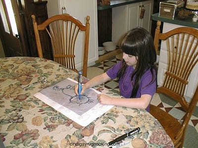 Alaina getting ready to rug hook