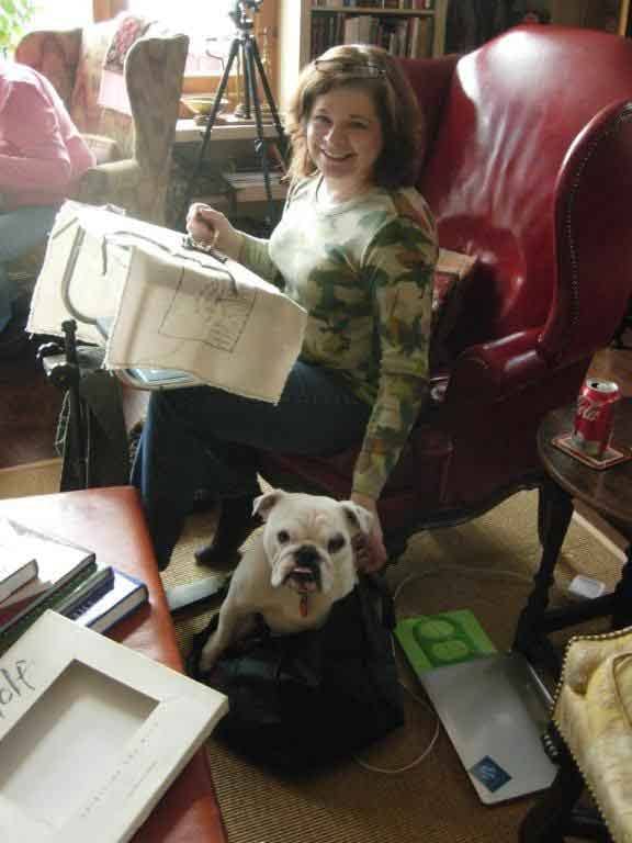 Cindi Gay rug hooking with Gladys the bulldog