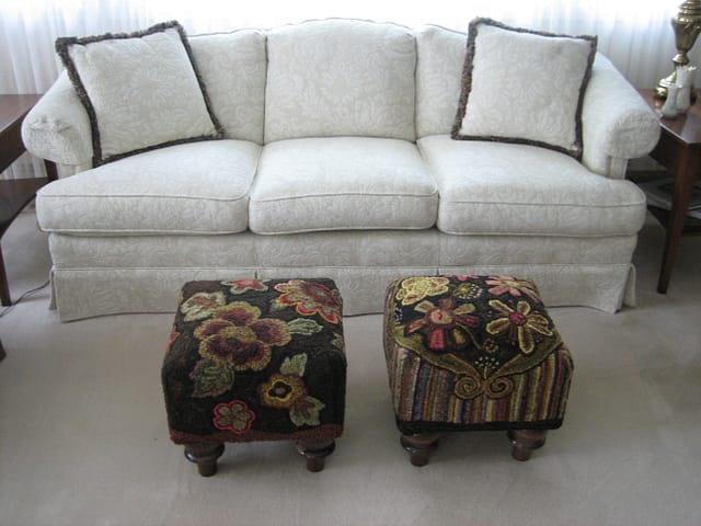 2 hooked footstools by Pat Mensing