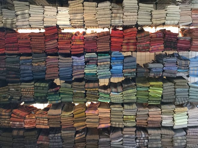 wall of wool Cindi Gay rug hooking studio